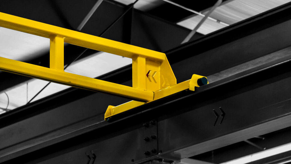 1/4 ton pwi freestanding hyperlite crane cm shopstar hoist in manufacturing setting 5