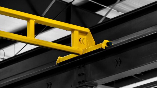 1/4 ton pwi freestanding hyperlite crane cm shopstar hoist in manufacturing setting 5