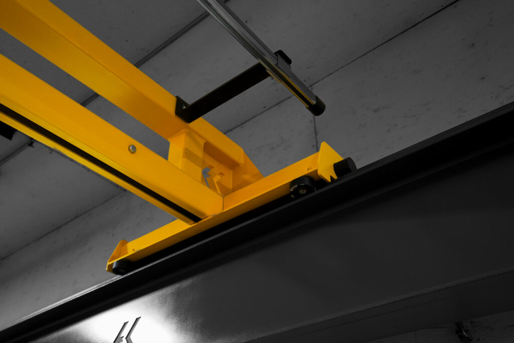 1 ton pwi freestanding hyperlite crane starke hoist withy anver lifter in manufacturing setting 13