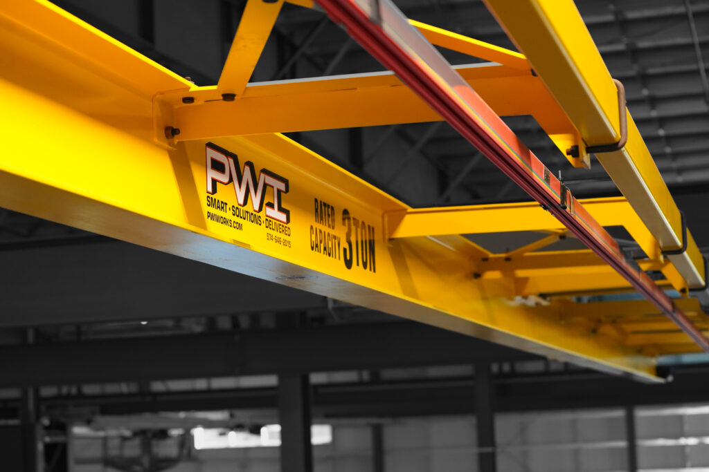 3 ton pwi truss design underhung motorized crane shawbox wire rope hoist in manufacturing setting 3