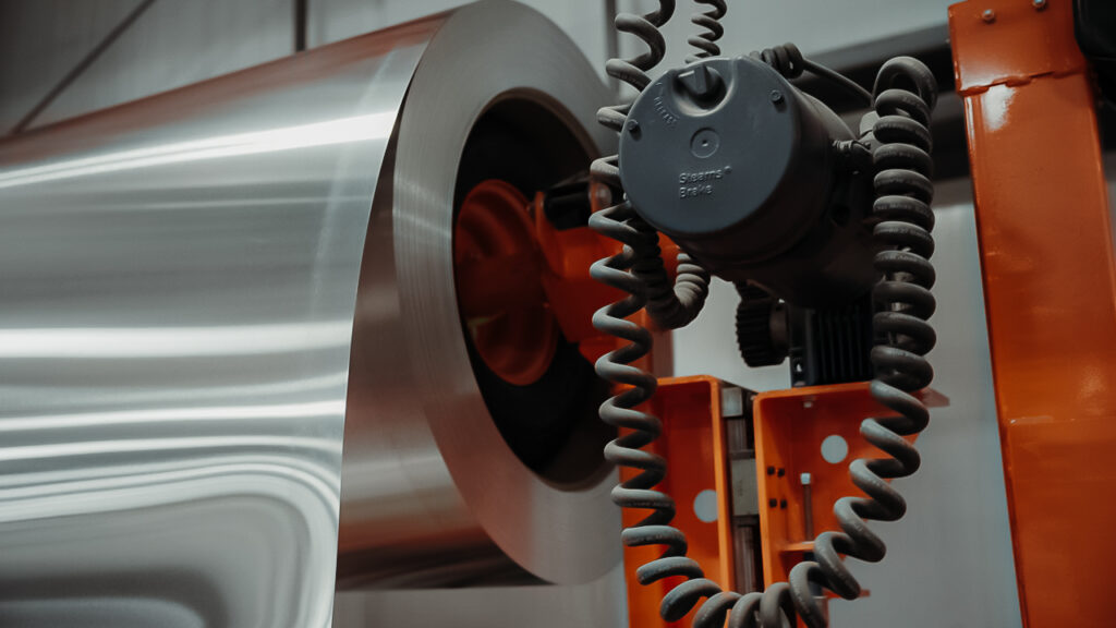 4 thousand pound capacity decoiler motor in manufacturing setting