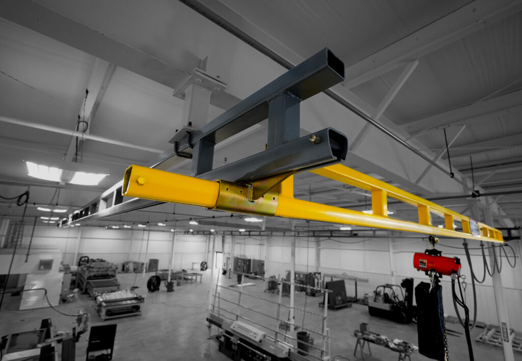half ton hyperlite ceiling mounted bridge crane in manufacturing setting 4