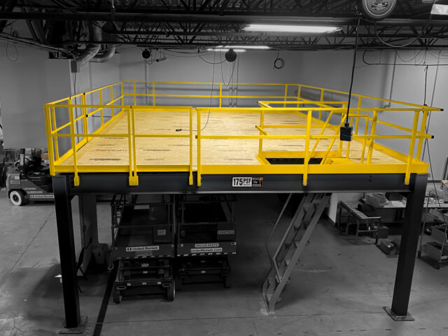 production mezzanine guard rail in manufacturing setting